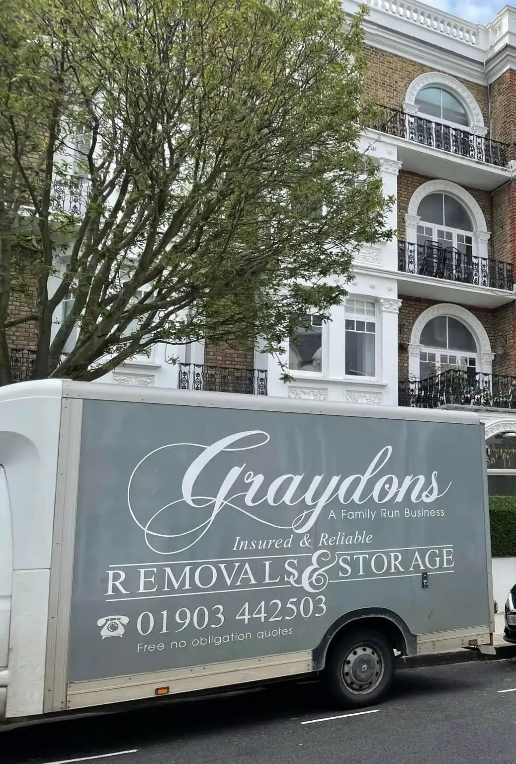 Graydens van outside block of flats.